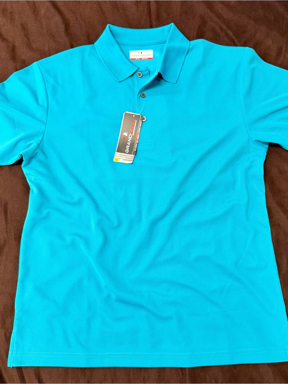 Grand Slam Men’s Polo in Bright Teal